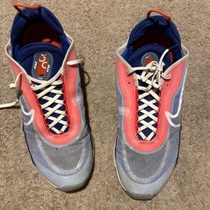 Nike sneakers red white and blue.